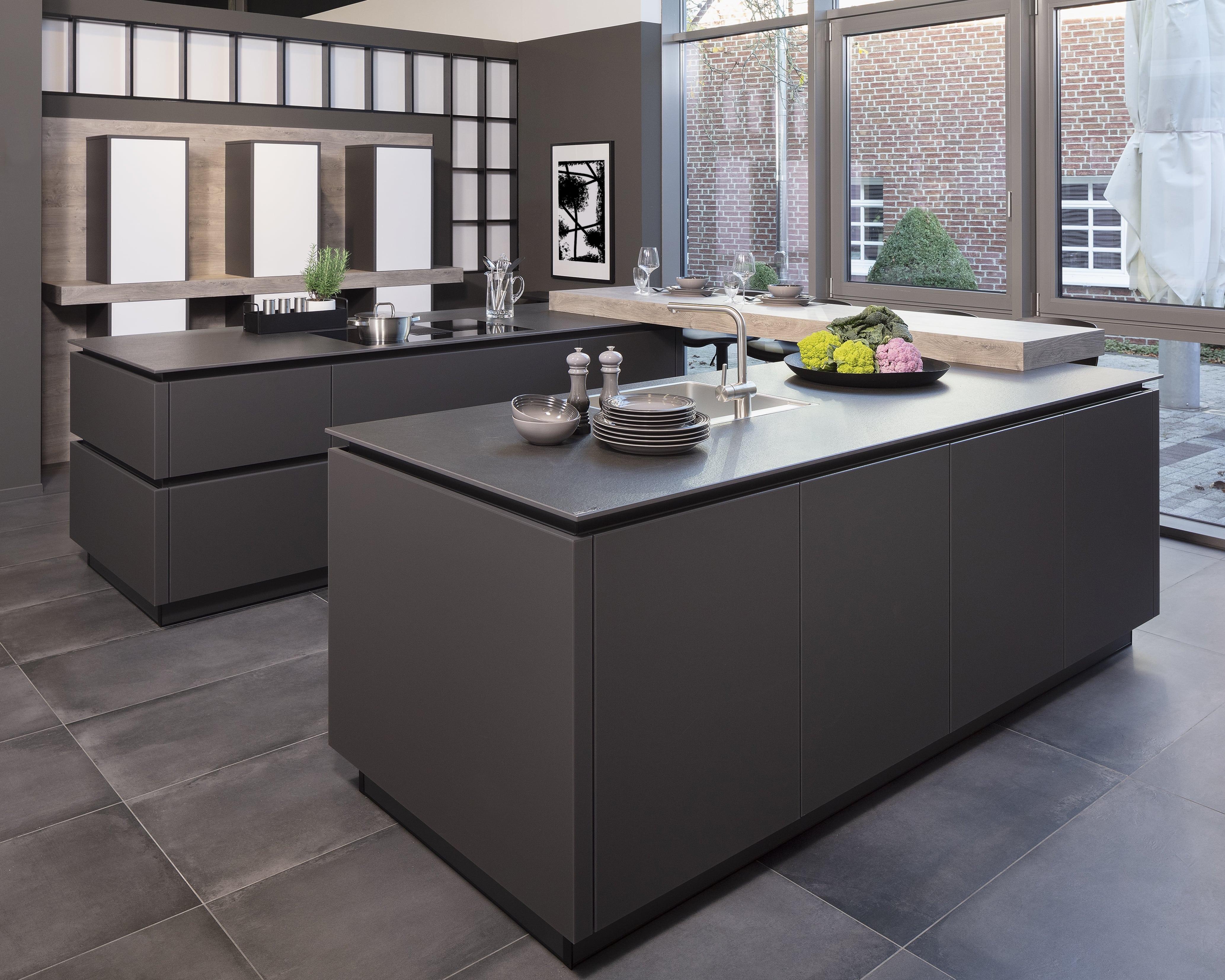 ARTEGO grifflos weiß und Graphit mit Keramik-Arbeitsplatte